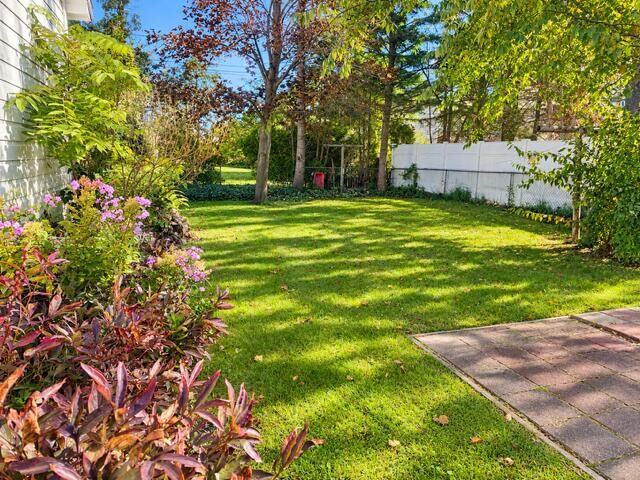 Property Photo:  115 E Lewis Street  MI 49707 