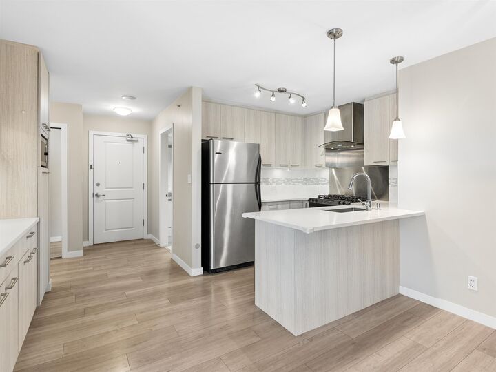 Property Photo:  8480 Granville Avenue 219  BC V6Y 4E8 