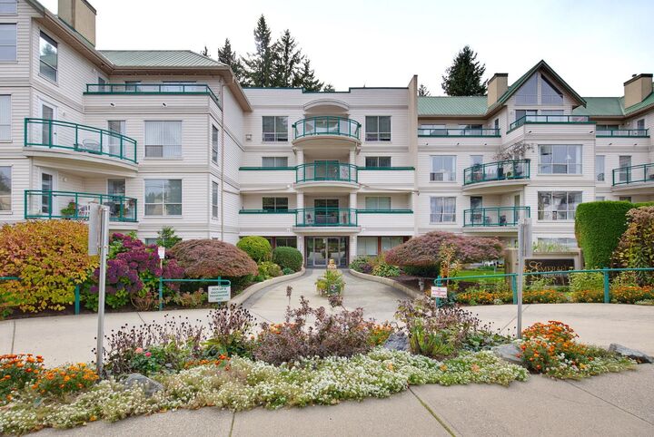 Property Photo:  33280 E Bourquin Crescent 208  BC V2S 7K2 