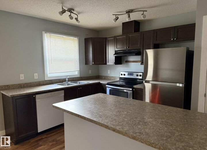 Property Photo:  6032 38 Avenue NW 30  AB T6L 0A4 