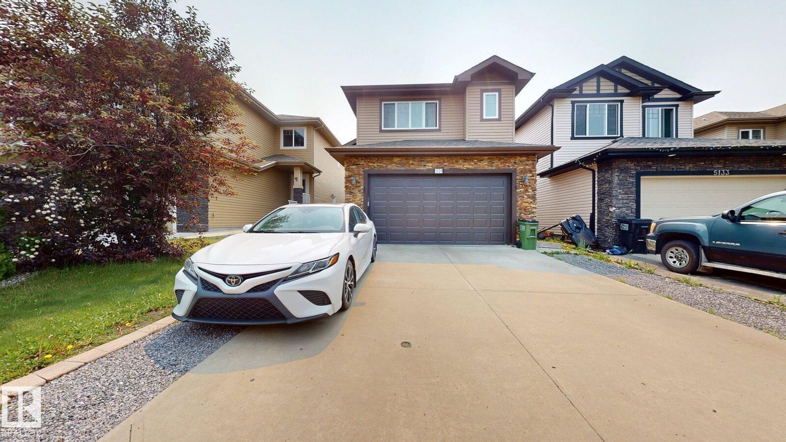 Property Photo:  5129 1B Avenue SW  AB T6X 0Z7 