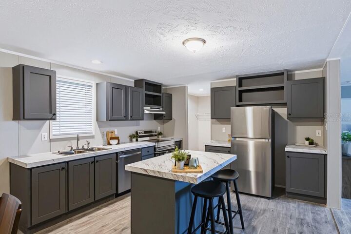 Property Photo:  25124 Huckleberry Way  FL 34705 