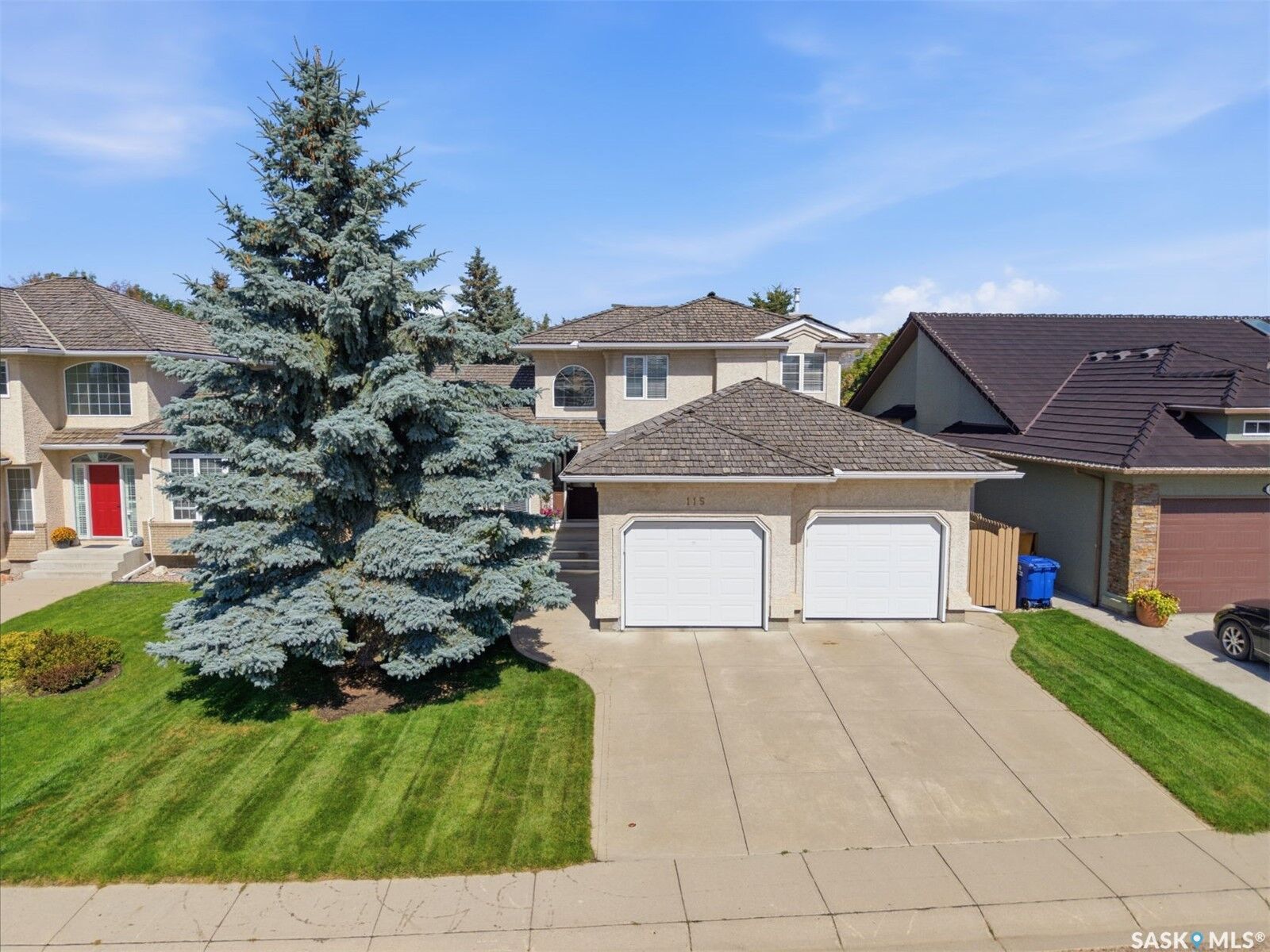 Property Photo:  115 Braeshire Lane  SK S7V 1A1 
