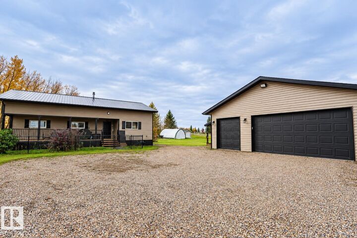Property Photo:  225 & 227 57201 Range Road 102  AB T0A 3A0 
