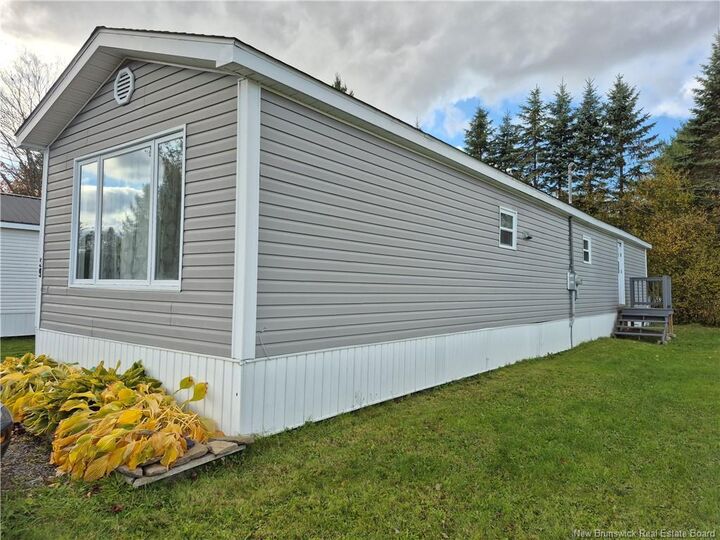 Property Photo:  59 Tamarack Drive  NB E3B 6V2 