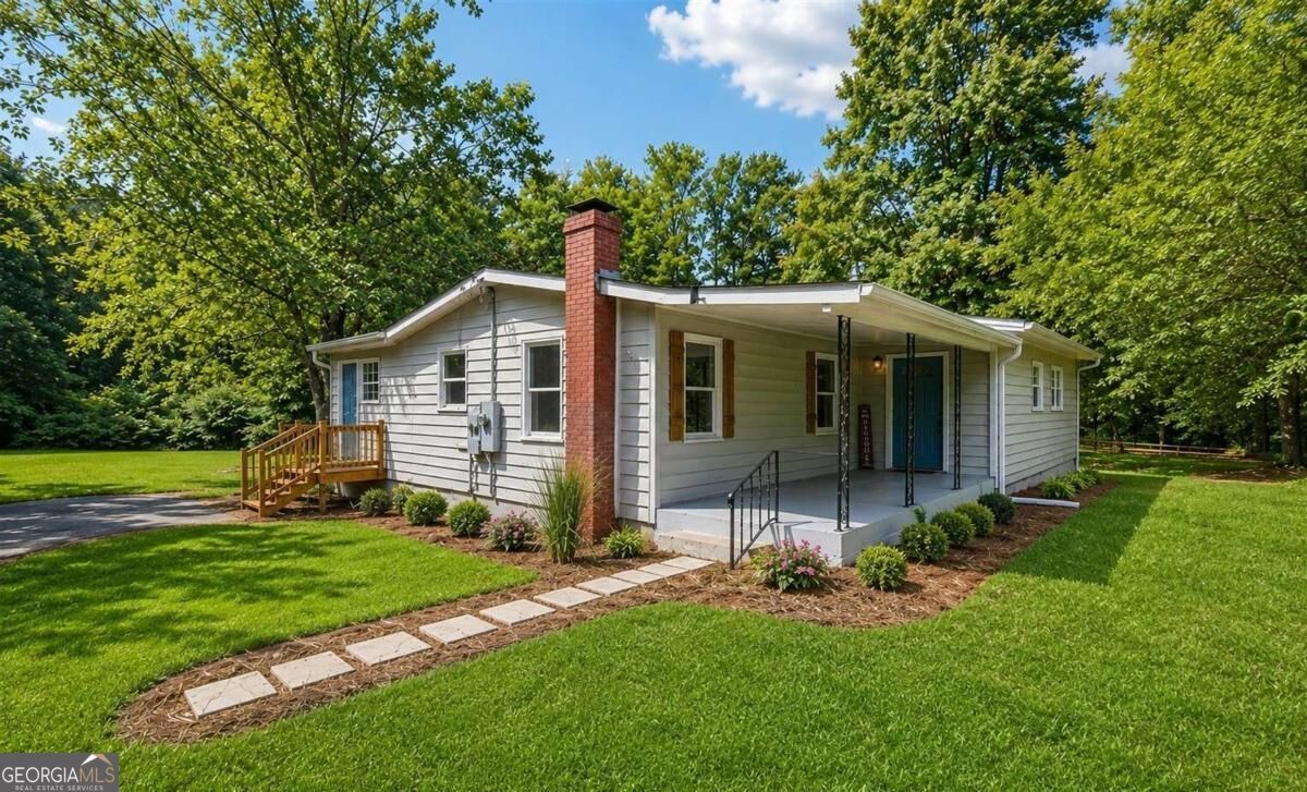 Property Photo:  309 Cowan Road SE  GA 30094 