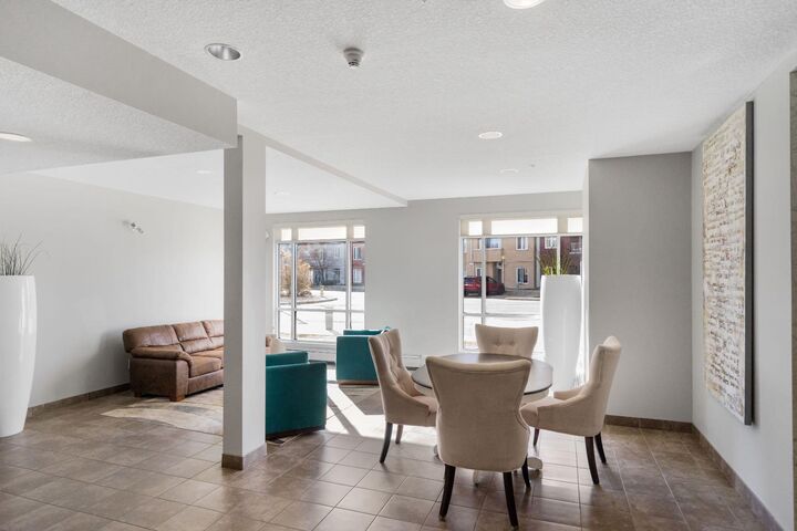 Property Photo:  604 East Lake Boulevard NE 2118  AB T4B 0G6 