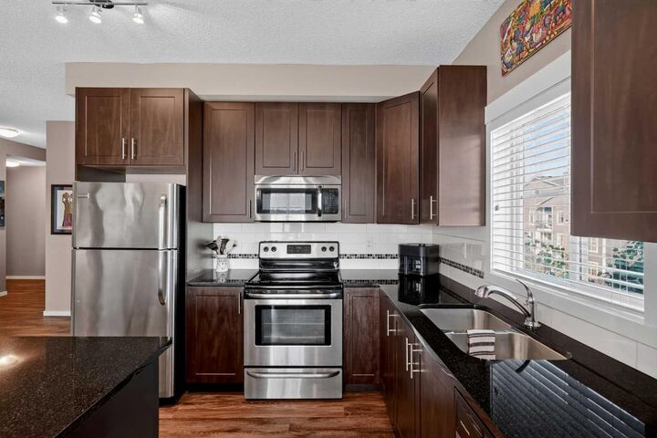 Property Photo: 755 Copperpond Boulevard SE 1409 AB T2Z 4R2