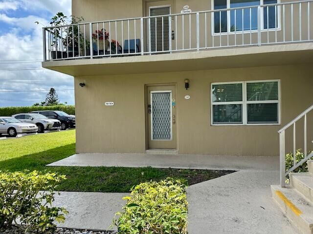 Property Photo: 769 Burgundy Q FL 33484