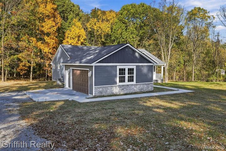 Property Photo:  12421 White Lake Road Road  MI 48430 