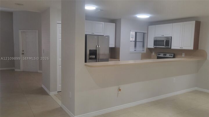 Property Photo:  22811 SW 88th Pl 8-22  FL 33190 