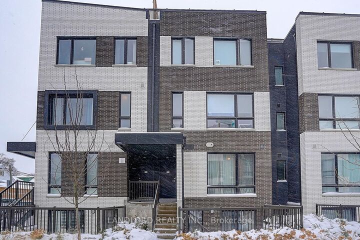 Property Photo: 30 Ed Clark Gardens Th13 ON M6N 0B5