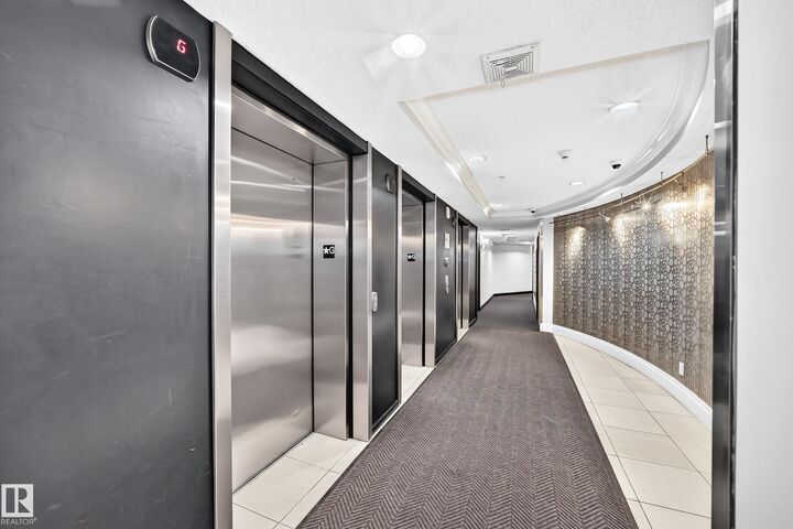 Property Photo:  9020 Jasper Avenue NW 103  AB T5H 3S8 