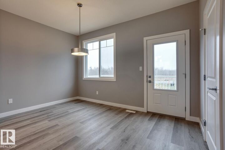 Property Photo:  13139 205 Street NW 84  AB T5S 0N1 