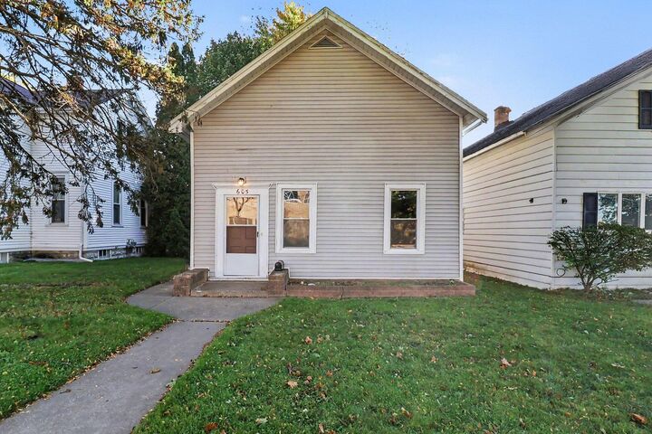 Property Photo:  605 Maple Street  MI 49660 