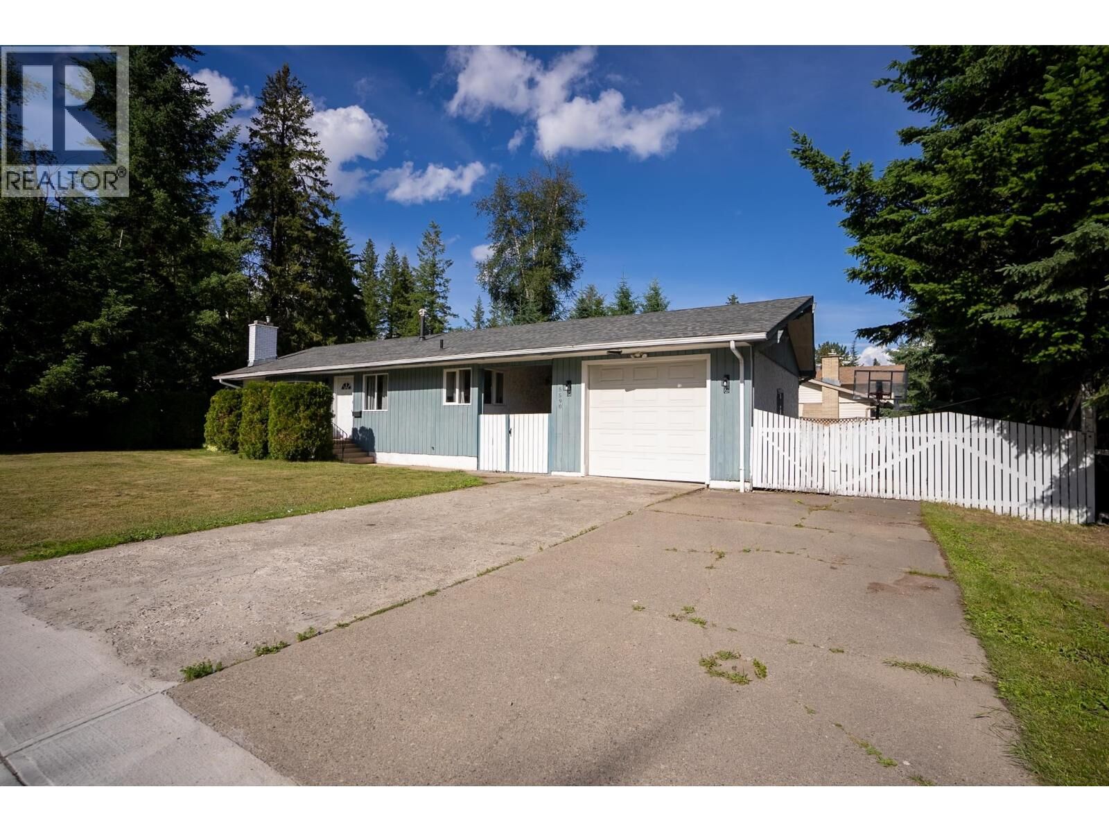 Property Photo:  5590 Simon Fraser Avenue  BC V2N 2C2 