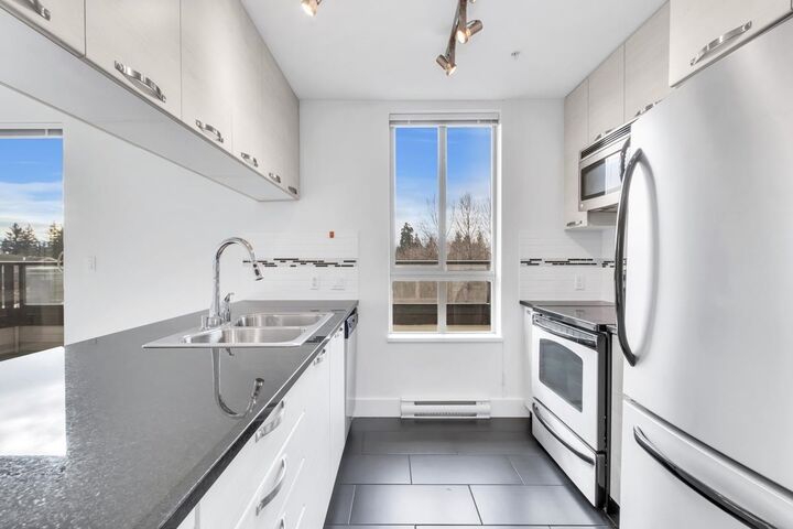 Property Photo:  7418 Byrnepark Walk 417  BC V3N 0B3 