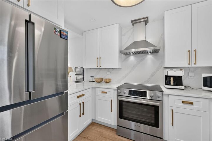 Property Photo:  1100 9th St S A201  FL 34102 