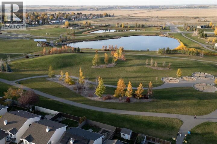 Property Photo:  202 Cougar Way North  AB T1H 6P4 