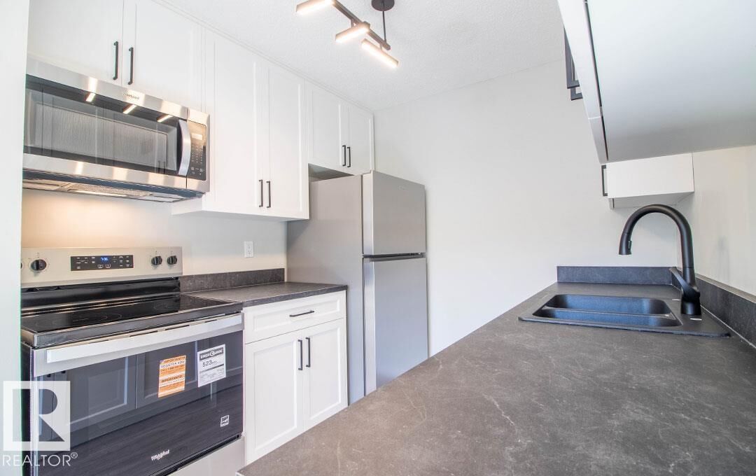 Property Photo:  3129 139 Avenue NW  AB T5Y 1R4 
