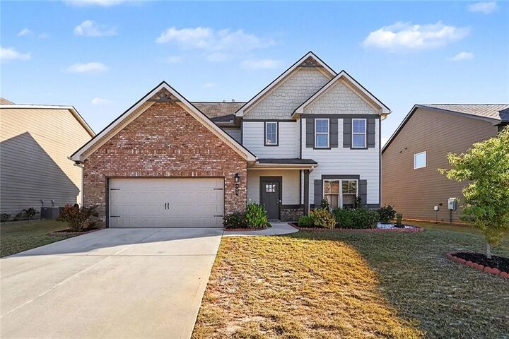 Property Photo:  305 Eleanora Crossing  GA 30052 