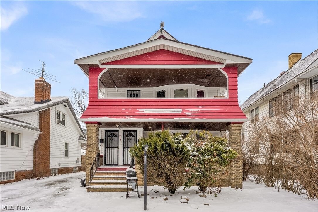 Property Photo: 1063 E 171st Street 1/Dn OH 44119