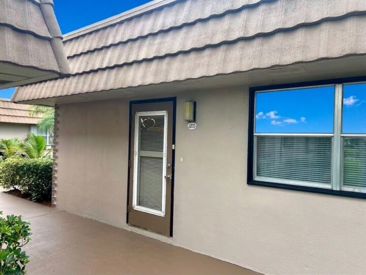 Property Photo:  233 Seville J Boulevard  FL 33484 