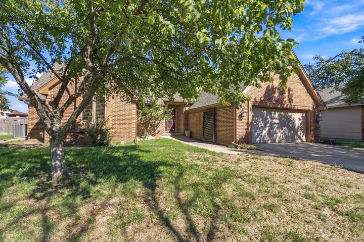 Property Photo: 7916 E 26th St N KS 67226-1158