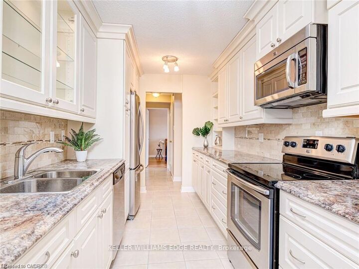 Property Photo:  2055 Upper Middle Road 302  ON L7P 3P4 
