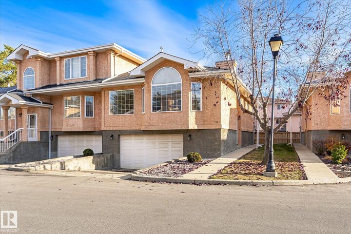 Property Photo:  11115 9 Ave NW 111  AB T6J 6Z1 