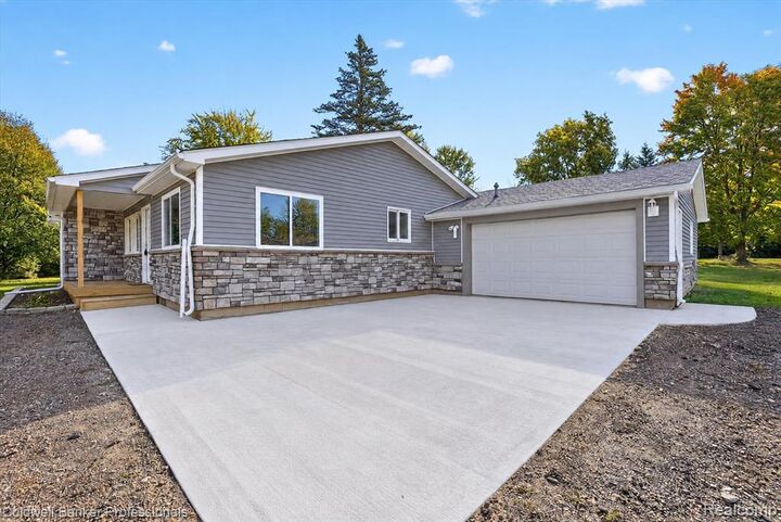 Property Photo: 3035 Ponemah Drive MI 48430