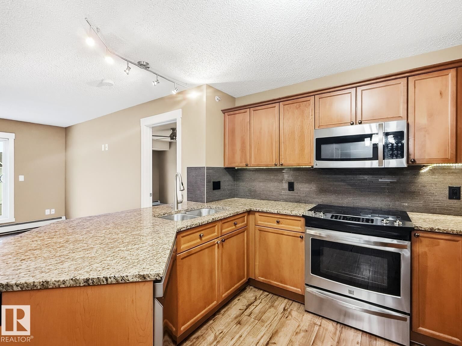 Property Photo:  13830 150 Avenue NW 406  AB T6V 1X2 