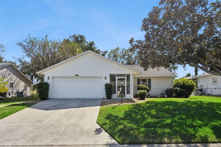 Property Photo: 26233 Newcombe Circle FL 34748