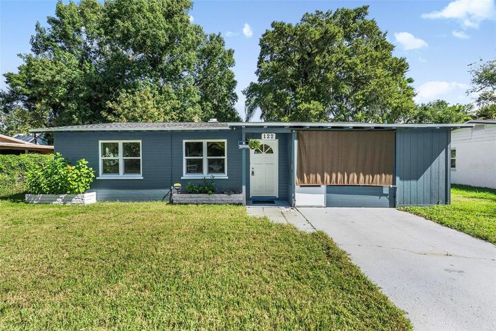 Property Photo:  122 Palm Drive  FL 32117 