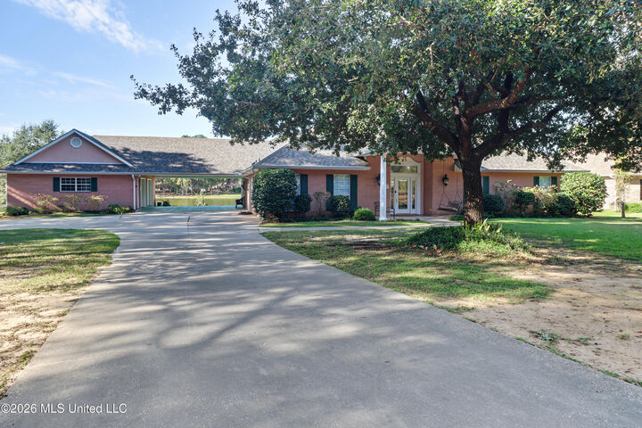 Property Photo:  6007 Angler Drive  MS 39466 