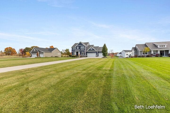 Property Photo:  8970 Sterling Hills Drive NE  MI 49341 