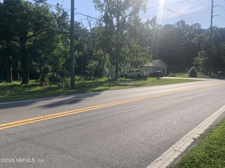 Property Photo:  5871 Collins Road  FL 32244 