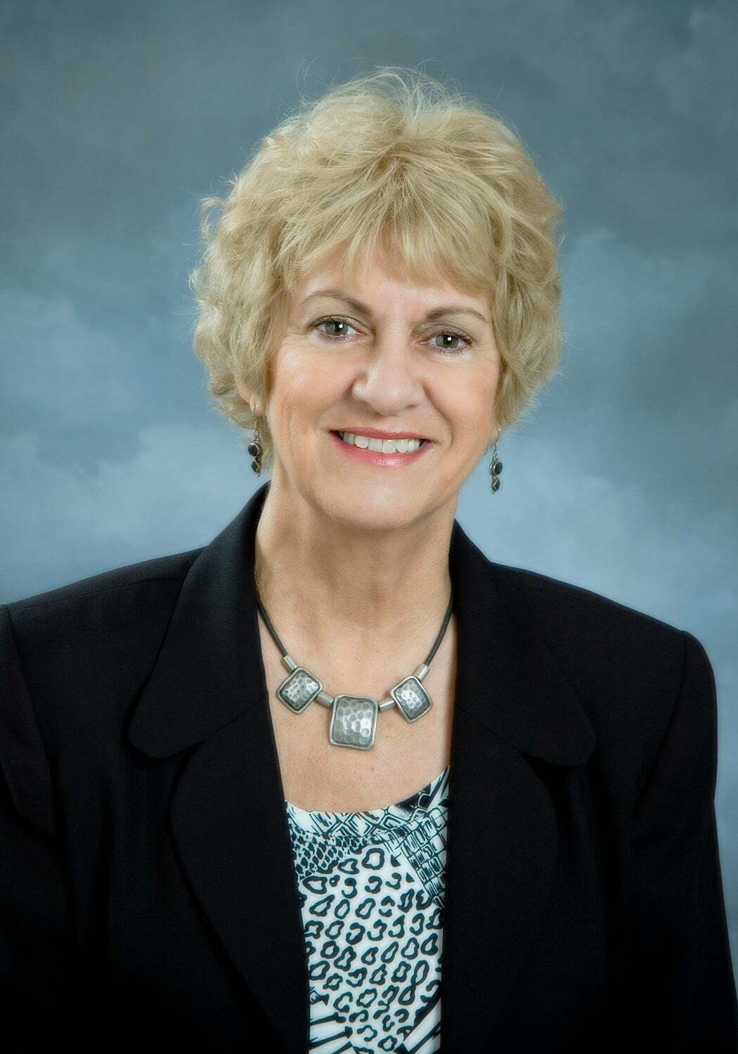 Jean Amos,  in Starkville, S.R.E. Realtors