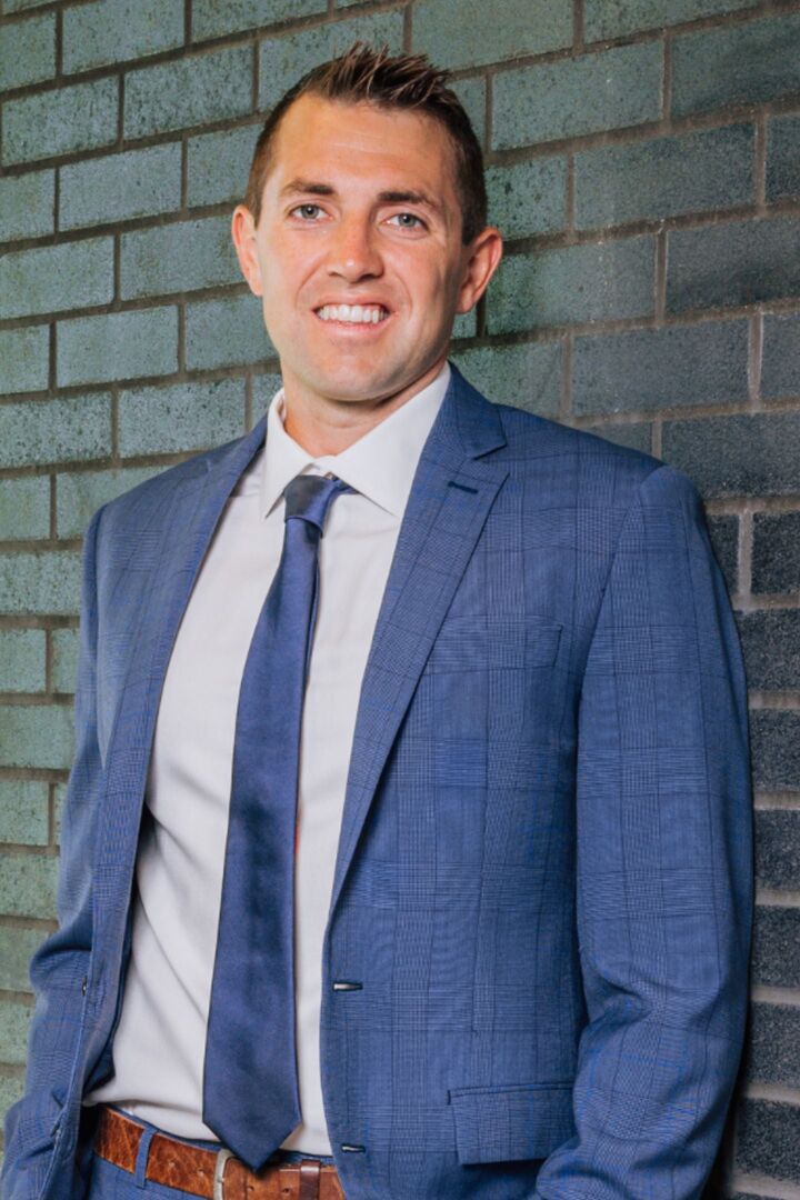 Tyler George,  in Okemos, Professionals