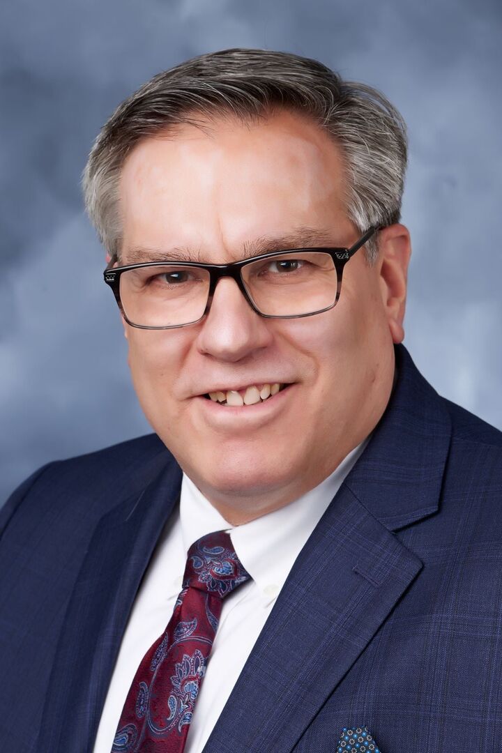 George Stathakis,  in Northville, Professionals