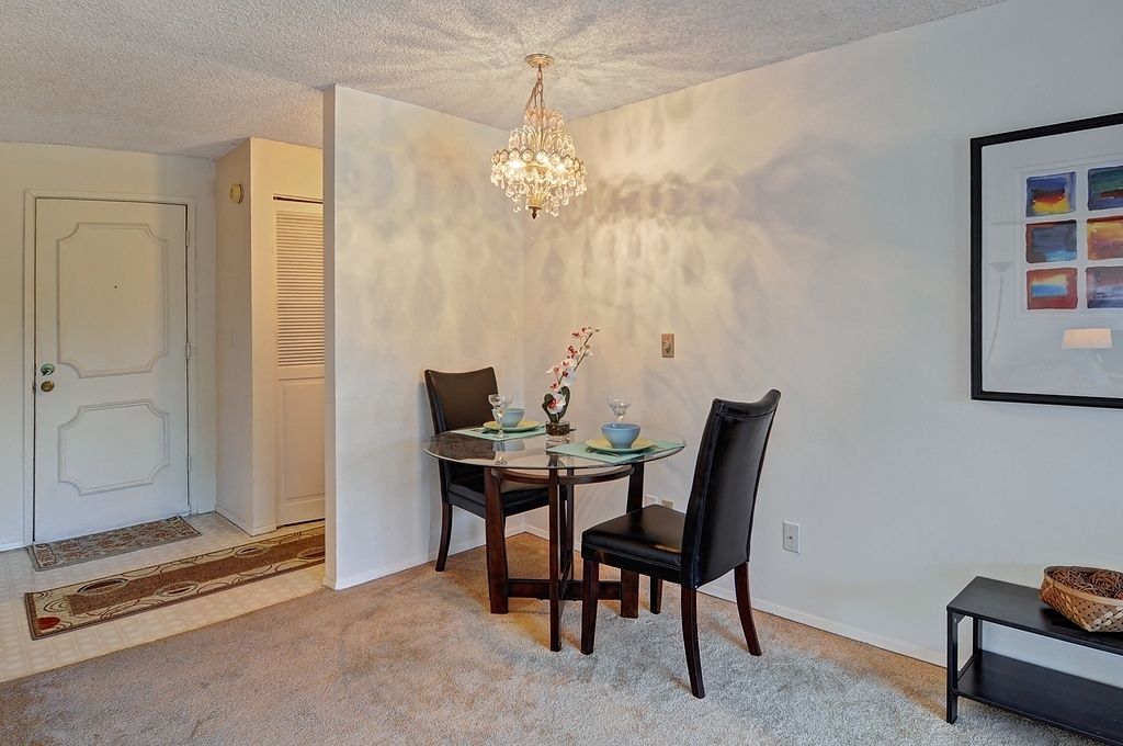 Property Photo: Great room - dining area 9500 Rainier Ave S 202  WA 98118 
