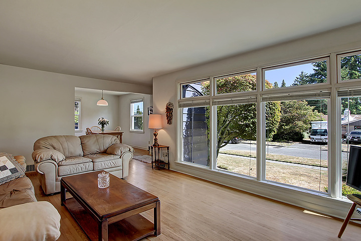 Property Photo: Living room, dining room & open kitchen 7749 44th Ave NE  WA 98115 