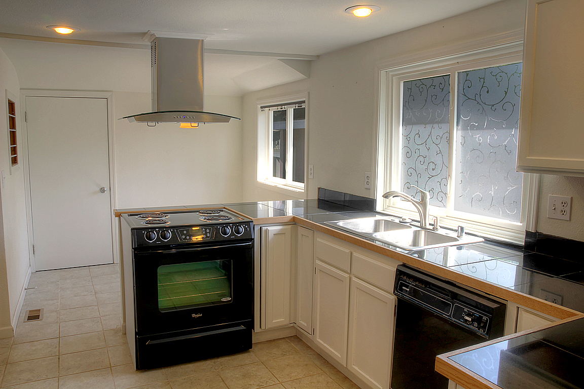 Property Photo: Kitchen with eating space 1022 SW Portland St  WA 98106 