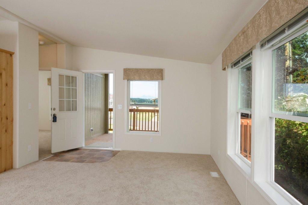 Property Photo: Living room 8585 Harborview Rd 9 WA 98230
