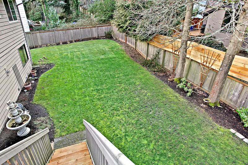 Property Photo: Backyard and deck 17000 NE 34th Place  WA 98008 