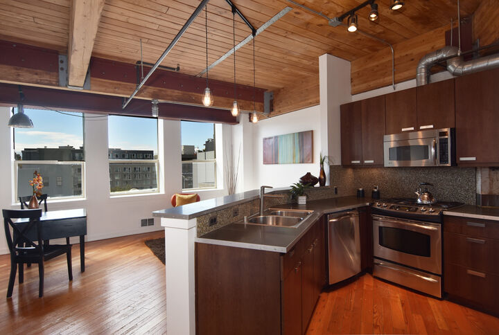 Property Photo: Great room & kitchen 1408 12th Ave 302 WA 98122